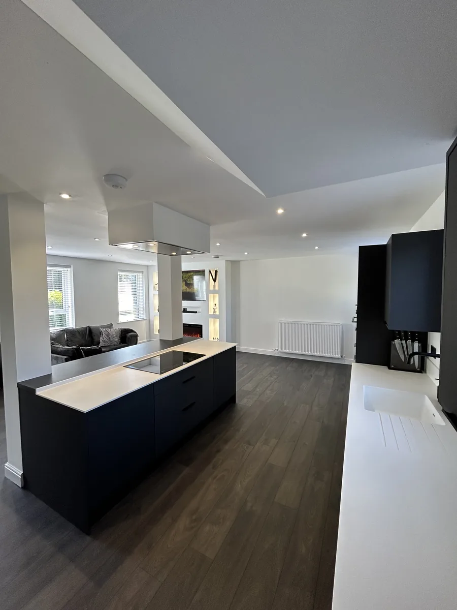 Finished Fife kitchen with recessed downlighters and accent lighting